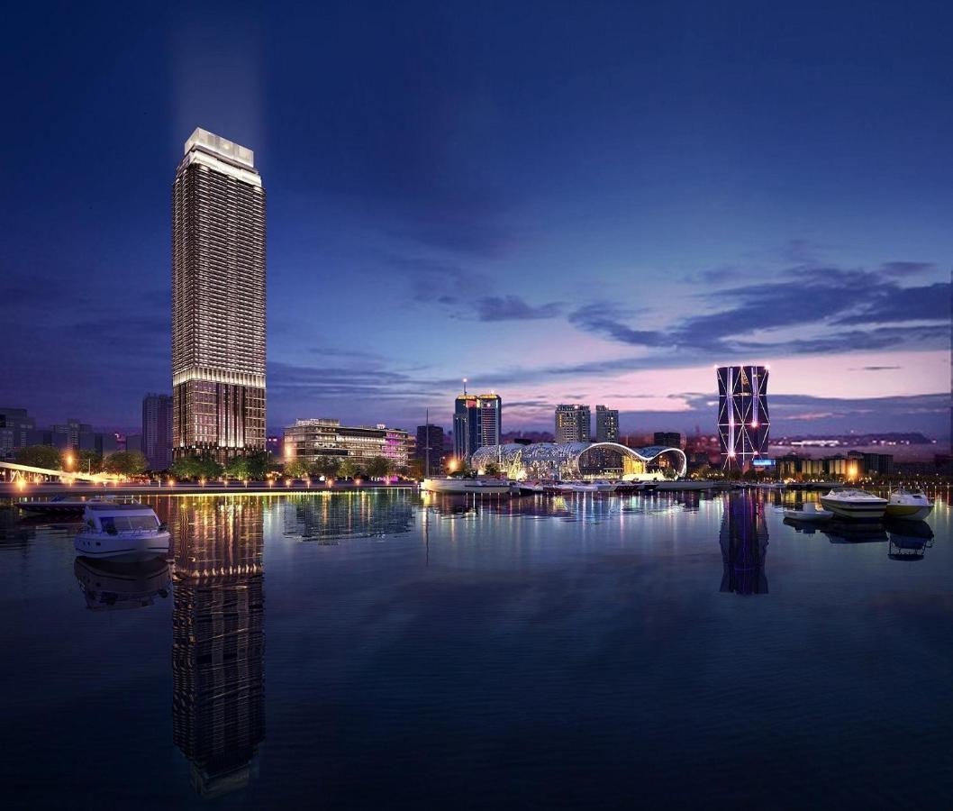 Intercontinental Kaohsiung By Ihg Otel Dış mekan fotoğraf The complex at night